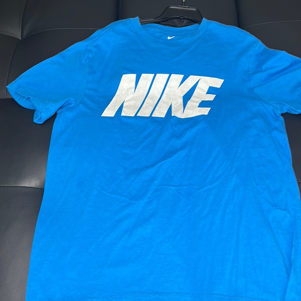 Blue Nike shirt